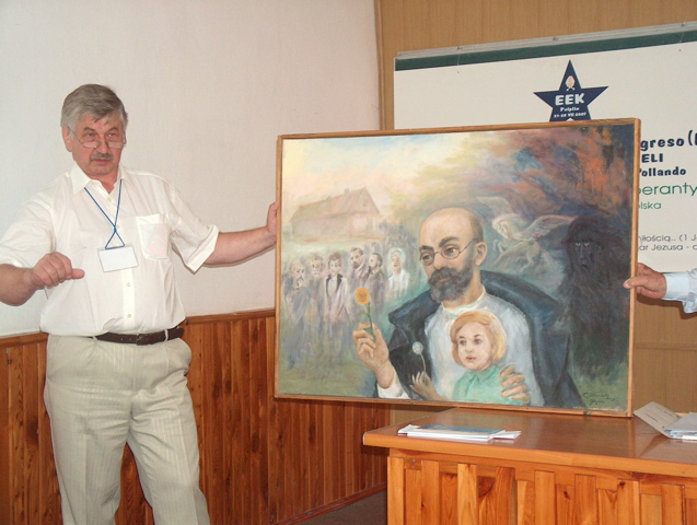 Edward Kozyra prezentas pentraĵon kun Zamenhof, Lydia kaj aliaj esperantistoj